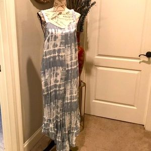 Japna asymmetrical sunsuit will in dusty blue tie dye. Size Small